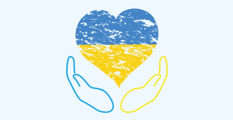 logo wspieramy Ukrainę dłonie trzymają niebiesko żółte serce.jpg