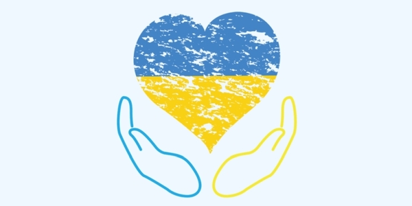 logo wspieramy Ukrainę dłonie trzymają niebiesko żółte serce.jpg